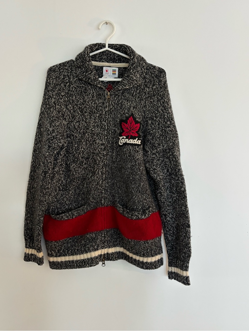 Canada Half-Zip Marled Black Sweater with Red Accent